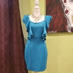 Blue Dress With Ruffles And Criss Cross Back